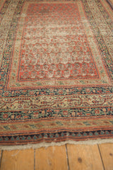 Antique Serbend rug's outer border with reciprocating pawn motif and visibly tattered fringe.