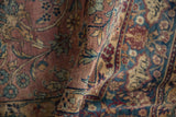 Folded Fine Yezd rug with deep purple pile texture and scrolling floral vinery.