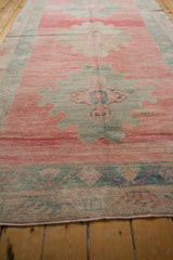 Textured pile showing even wear in pink, dusty blush, and oxidized silver.