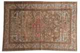 Distressed vintage hand-knotted Turkish Kaisary rug with blush medallion and brown floral vines.