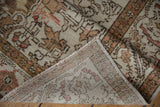 Hand-knotted foundation and fringe of distressed Vintage Kaisary rug; dusty blush pile.
