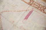 Distressed Oushak runner texture, raspberry cochineal purple, and brown stepped hook motif.