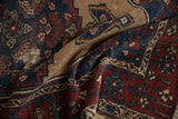 Tattered edge, worn Hamadan rug pile revealing foundation in madder root and indigo.