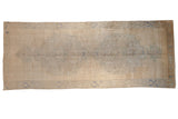 Distressed Oushak rug runner features faded blue double medallions on an ivory-sand abrashed ground.