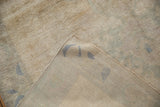 Hand-knotted foundation and distressed ivory pile of the vintage Oushak runner.