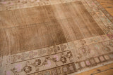 Distressed Kars carpet's short pile, pale coffee and pink floral borders, seed pattern.