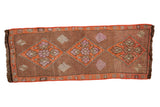 Distressed vintage Kars runner with brown field, orange floral diamond medallions, 1'5