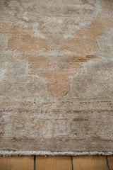 Distressed Oushak rug texture in sandalwood, seafoam, and antique ivory with faint Rococo outlines.