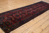 Lustrous ruby red field and sapphire blue palmettes in the vintage Lilihan runner's trellis pattern.