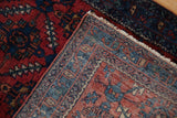 Hand-knotted foundation and intact original selvage of a vintage Lilihan rug.