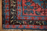 Vintage Mehreban rug corner, red and sky blue trefoil pawn border with ivory fringe.