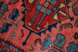 Fine Mehreban rug detail: geometric floral blossoms and trefoil pawn motif in raspberry, sky blue.