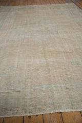 Textural surface of vintage distressed Oushak carpet, with wear to foundation.