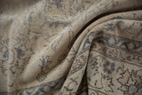 Distressed vintage Sparta rug showing faded blue pattern and prominent foundation wear.