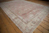Distressed Sivas Carpet with rose and antique ivory scrolling palmettes, showing mostly even wear to knot heads.