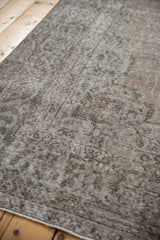 Textured, distressed Sparta carpet pile with even wear and oxidized silver.
