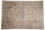 Distressed vintage Turkish Sparta carpet, ivory field with quatrefoil medallion and delicate teal vinery.