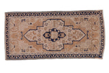 Distressed vintage Oushak rug runner, stylized shield medallion in muted beige, ivory, cobalt blue. Size 1'9