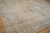 Distressed vintage Oushak carpet pile with ivory, seafoam green, and visible knot head wear.