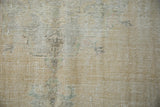 Distressed hand knotted Oushak pile showing visible foundation and ivory, sand, pale blue.