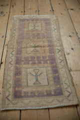 Distressed Oushak rug with a lavender and turquoise germinating tree of life medallion.