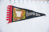 Vintage Hoover Dam felt pennant detail: red fringed edge and colorful dam graphic.