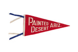 Red felt vintage Painted Desert Arizona pennant, white text, blue and cream ties, 14x7 inches.