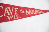 Stylized cream lettering and texture of the red vintage Cave of the Mounds felt flag.