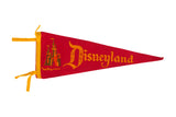 Vintage Disneyland felt flag featuring red and orange colors and the Disney Castle graphic.
