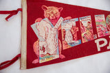 Red felt vintage pennant showing bear cub graphic, Great Falls, Golden Gate, Cleopatra Terrace.