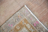 Close-up of the hand-knotted foundation and secured edge on a vintage Turkish Kars carpet.