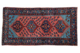 Vintage Persian Lilihan runner, circa 1930s, raspberry red field with Caspian shrimp motifs and aqua corners.