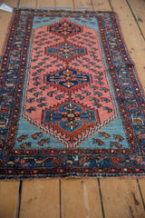 Vintage Lilihan runner's serrated center medallion, pale raspberry ground, Caspian shrimp motifs.