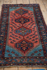 Vintage Lilihan runner detail with unusual Caspian sea shrimp on pale raspberry ground.