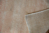 Hand knotted foundation and secured side cord of a vintage Turkish Oushak rug.