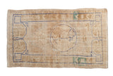 Distressed Vintage Oushak rug with ivory field, faded blue roundel medallion, and serpent border. 2'5