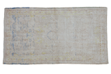 Vintage distressed Oushak runner with abrashed ivory, pale blue, and gold floral patterns.