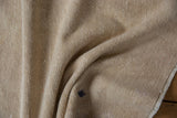 Hand-knotted reverse of the vintage Oushak rug, revealing natural beige foundation and painted mark.