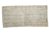 Distressed vintage Oushak runner with soft ivory and faded olive medallion, 2'1