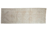 Vintage Distressed Oushak runner with faded diamond medallions and borders in antique ivory and beige, 3x8'7