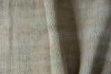 Reverse side of vintage Oushak rug runner, revealing tight hand-knotted foundation.