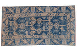 Distressed indigo blue hand-knotted Melas rug runner with geometric floral design. 3'8
