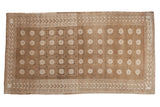 Distressed Vintage Oushak carpet featuring coffee brown, beige abrash, floral and wave patterns, 5'4