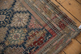 Intricate pawn design borders and fine weave on this antique Shirvan rug's worn corner.