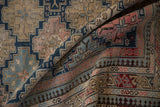 Fine weave intricate geometric patterns and pawn borders in navy, pink, beige antique Shirvan.