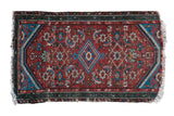 Vintage Hamadan rug with red field, diamond medallion, Herati design, and blue serpent borders.