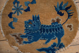 Detailed contour of blue floral cloudband with short pile texture and fringed edge.