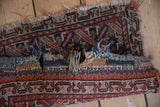 Antique Afshar rug showing hard tatter to plain woven kilim, and worn fringe.