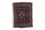 Vintage hand knotted Afshar rug mat, navy blue field with terracotta starburst and pawn motifs.