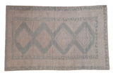 Distressed vintage Oushak rug, faded dusty blue geometric medallions on an ivory ground, 4'5